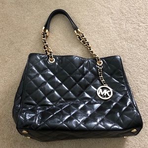 MK black quilted shoulder bag